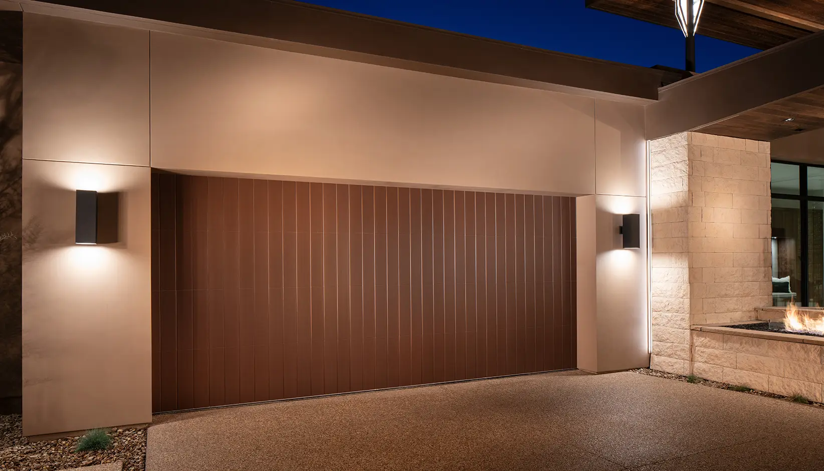 Clopay Canyon Ridge faux wood garage door on Kansas City home