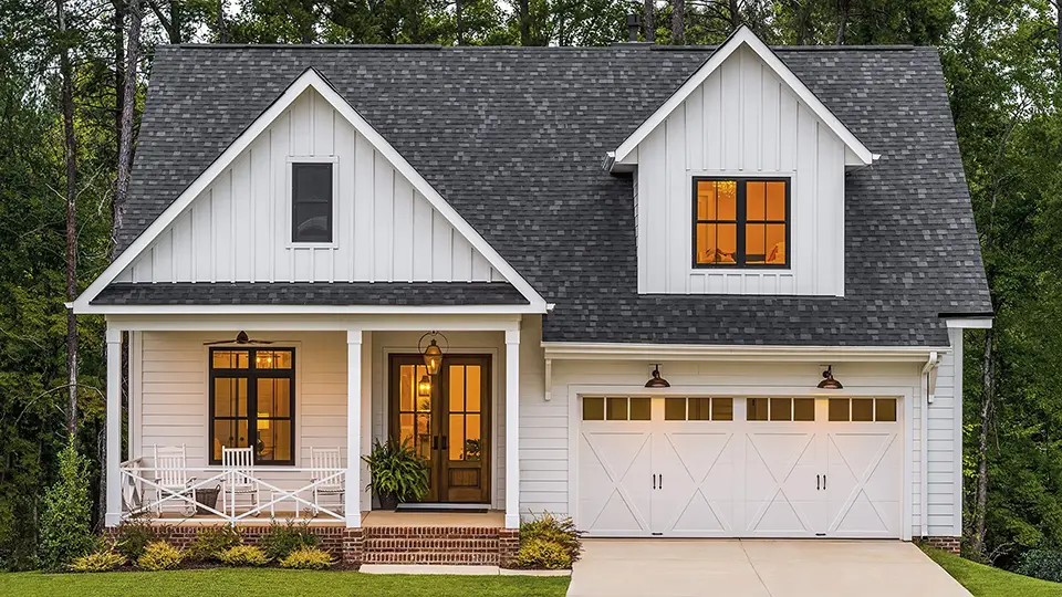 Clopay Coachman carriage house garage door on modern farmhouse