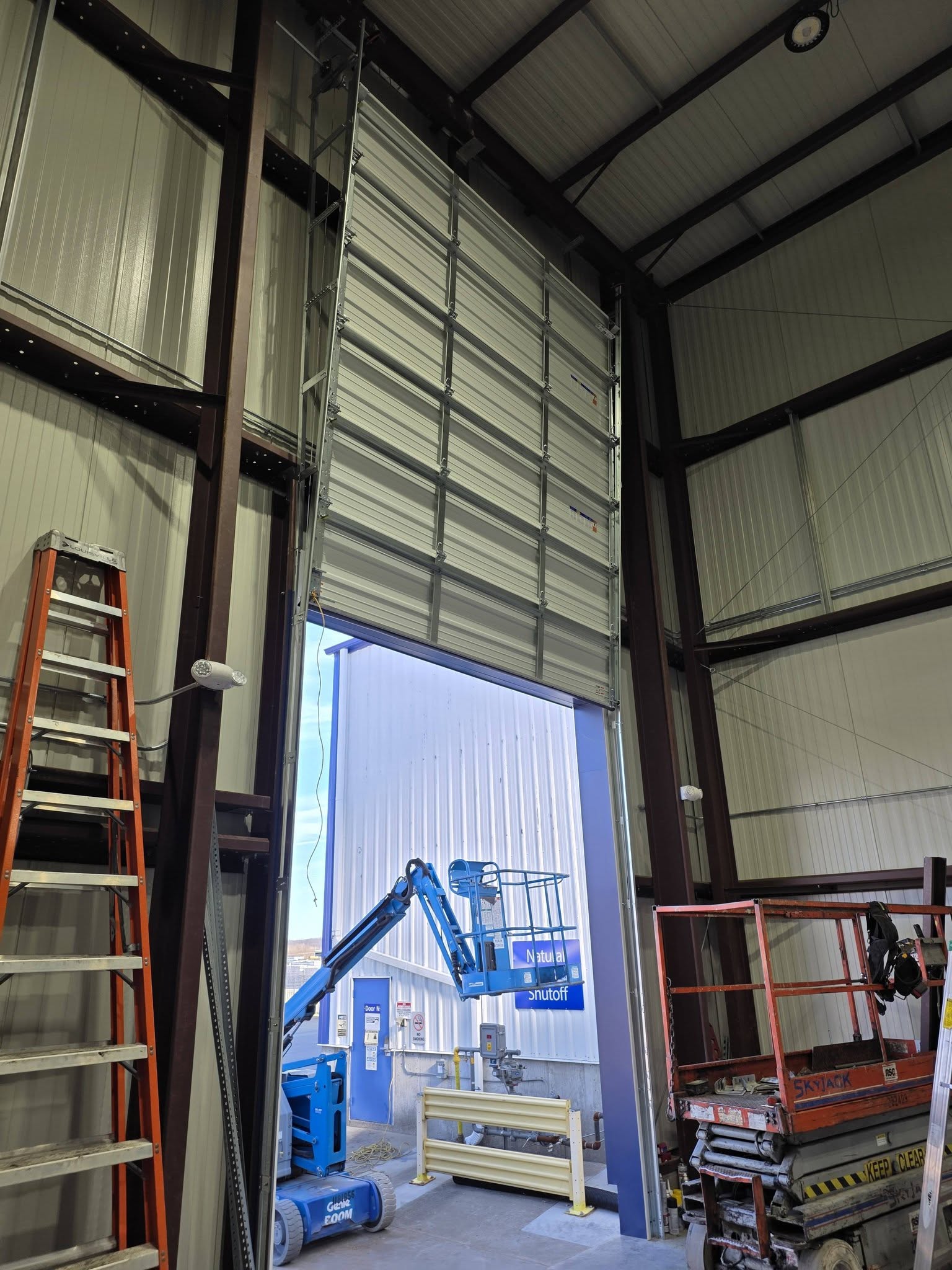 Large industrial overhead door completed installation