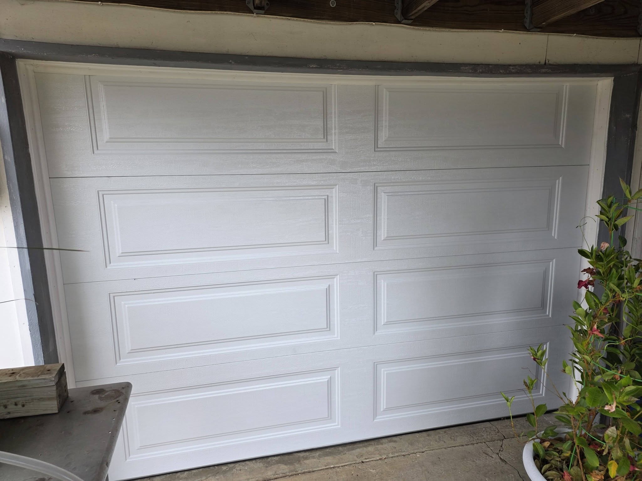 Clean new garage door installed after replacement